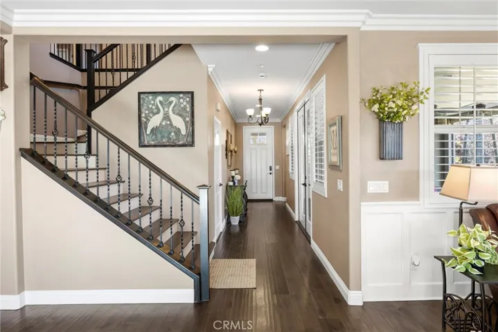 Hardwood floors, custom stair rails and shutters throughout the home.