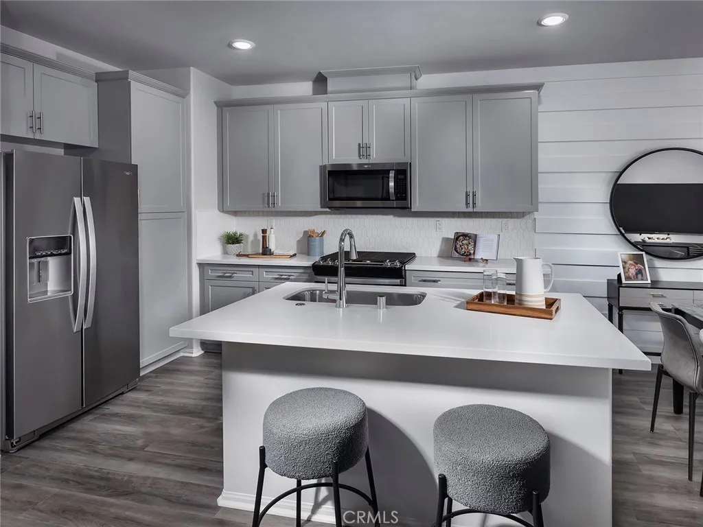 Photos are not of the actual home, but are photos of the builder home with same floorplan with similar interior finishes.