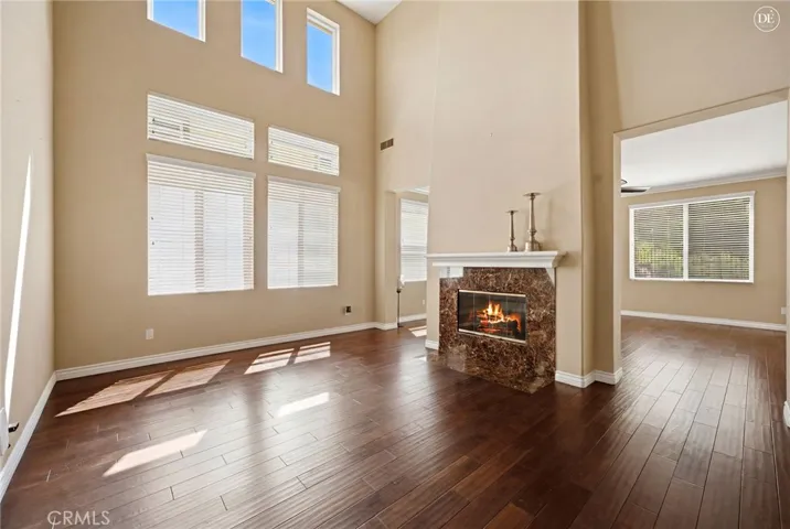 Formal living Room with lots of Natural Light