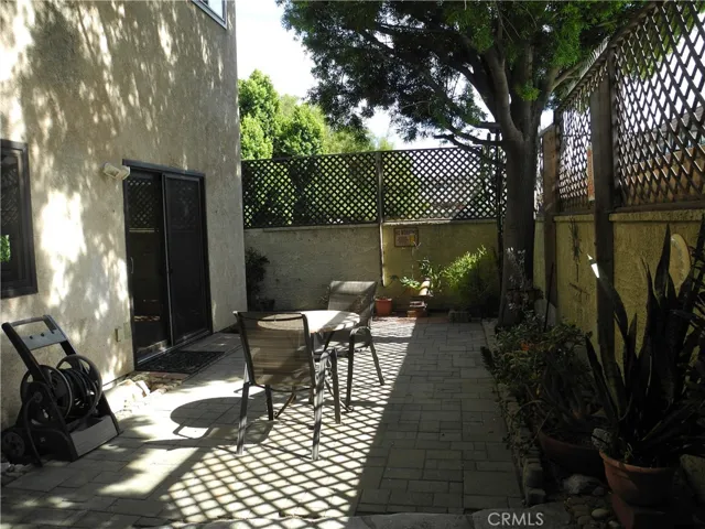 Patio with access from garage and slider in dining room