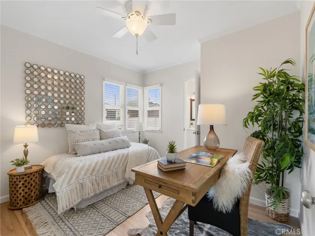 Office or bedroom with closet and attached powder room.