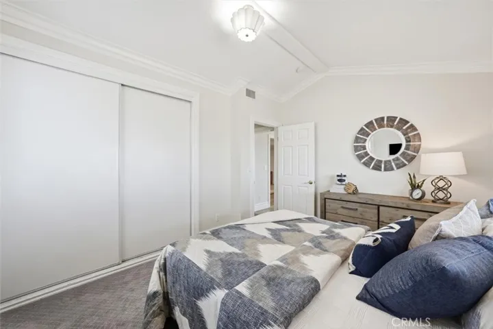 Front guest bedroom with vaulted ceiling