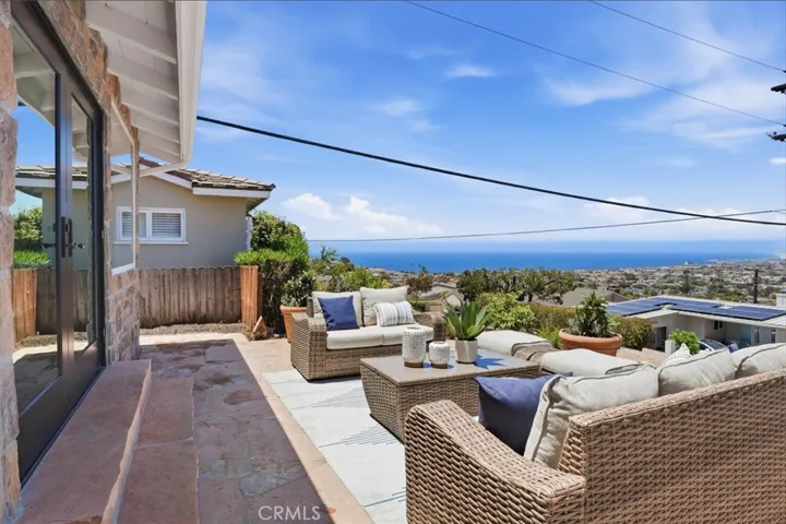Stone covered front patio with unobstructed views