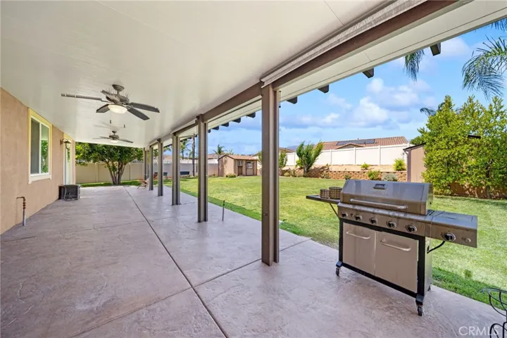 Large rear yard with alumawood cover