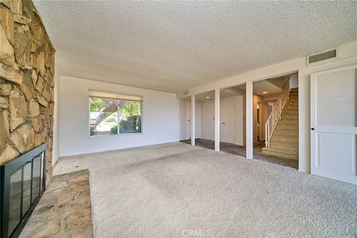 Fireplace anchors the home as you walk through the front door.