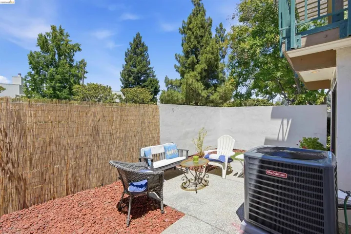 Private patio area featuring a concrete surface