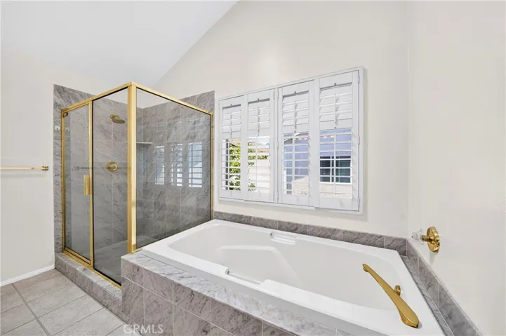 Separate Tub with all new Faucets, plantation shutters.