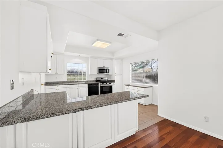 Large kitchen with Granite counters