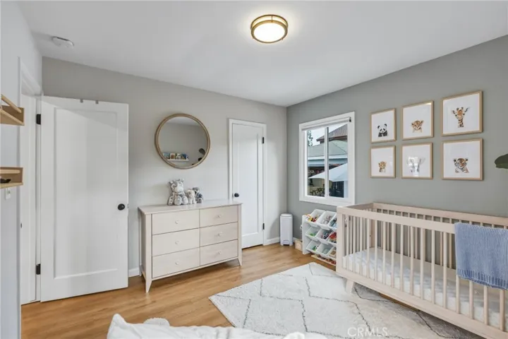 2nd bedroom with custom closet organizers