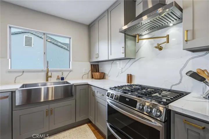 Kitchen with pot filler above the stove