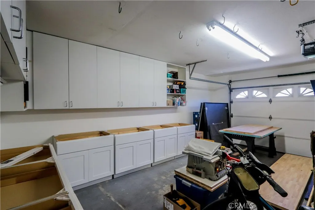 Double garage with a huge amount of recently added storage.  Wasfher and dryer included.  Door opener and sealed poxy floor