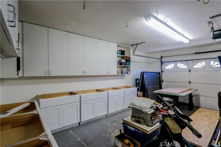 Double garage with a huge amount of recently added storage.  Wasfher and dryer included.  Door opener and sealed poxy floor