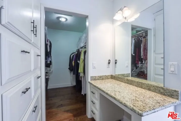 Walk in closet with vanity