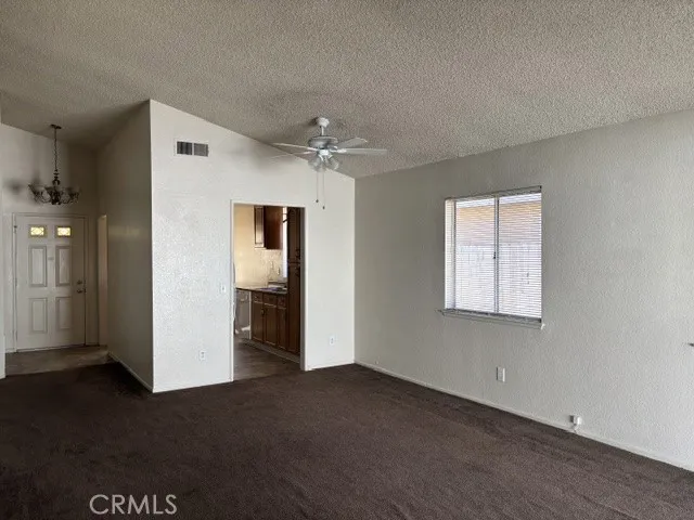 Living room walk into kitchen