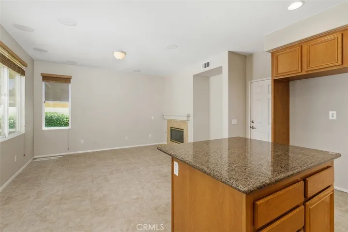 Family Room off Kitchen. Door to Garage