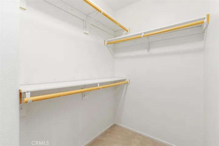 walk in closet in Primary Bedroom