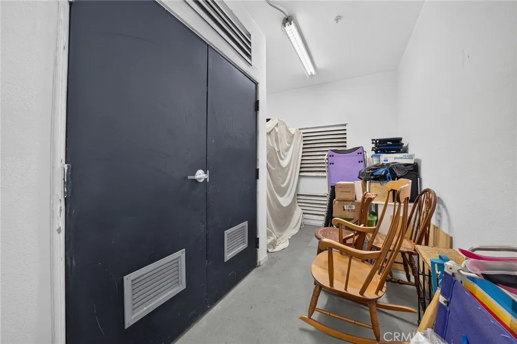 Shared private storage room in parking garage