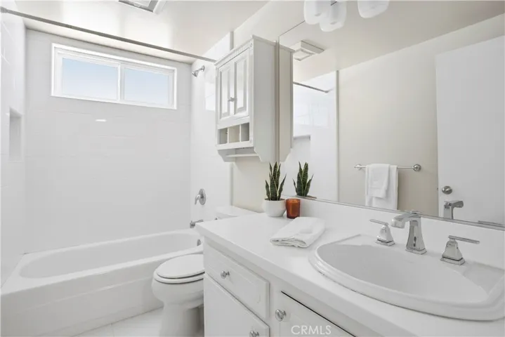 Fresh and bright remodeled bathroom.