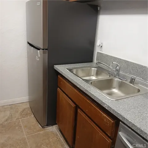 New refrigerator, sink, faucet.