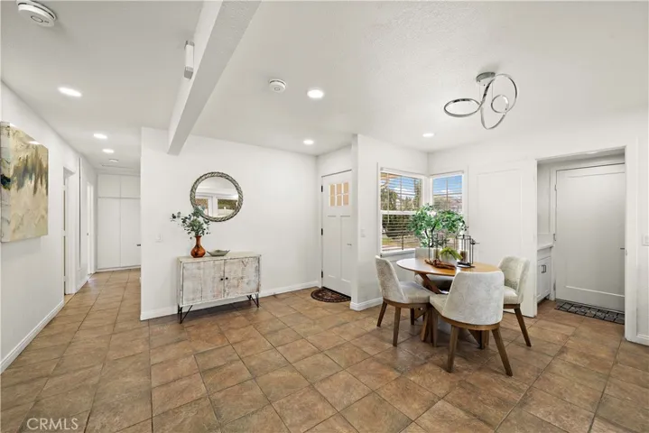 Entry door, entry, dining room - all open concept living areas
