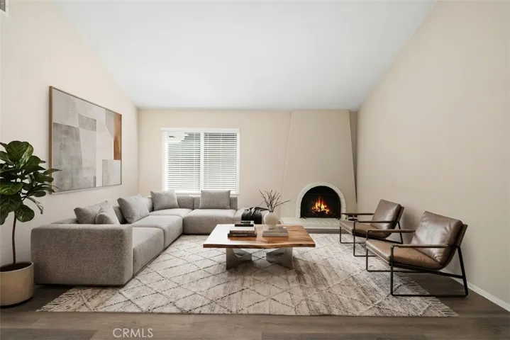 This photo of the living room has been virtually staged.