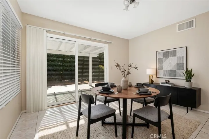 This photo of the dining area has been virtually staged