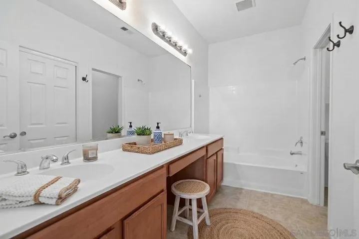 Bathroom 2 (Primary): https://zimg.paragon.ice.com/ParagonImages/Property/PA/SDMLS/-528701/10/533/400/f2593ff9a0a3947a6f51fceb5ede9a76/3/45c166dcfc41e81317d679587635fae6/-528701-86af0a9c-b1d5-4eed-9eb0-785bd3290578.JPG