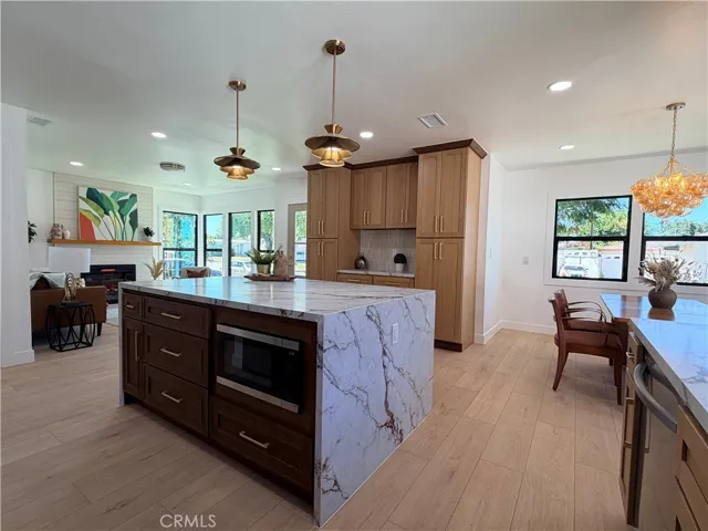 Massive prep island open to formal living and dining spaces.