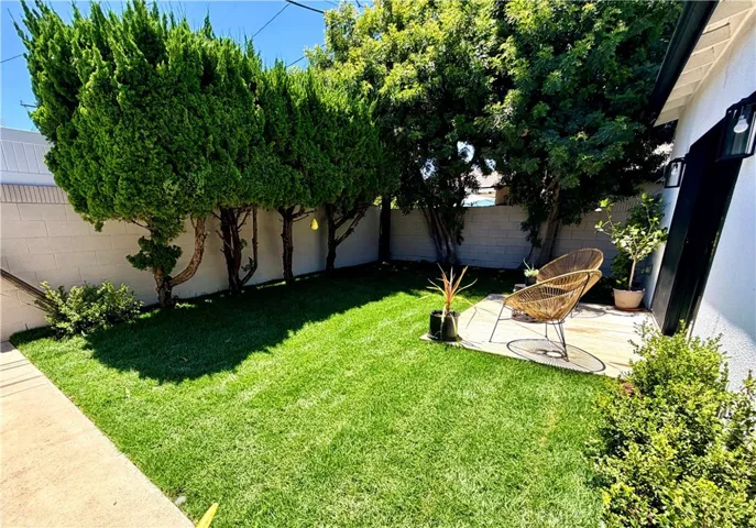 Lush private backyard off the Family/Game/Great room.