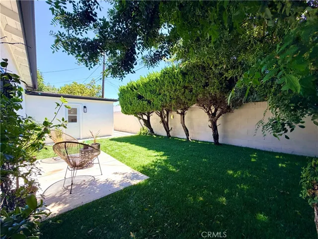 Lush private back yard, with room to roam and play.