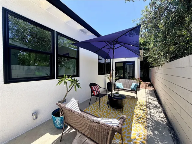 Private side yard patio for relaxing with a cup of coffee, or a glass of wine.