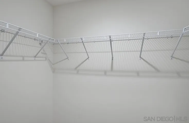 Dual walk-in closets in primary bedroom
