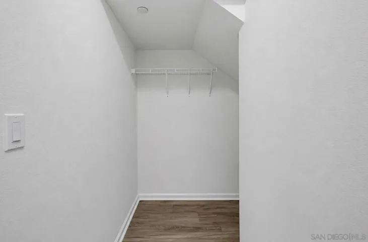 Hallway walk-in closet. Great storage space.