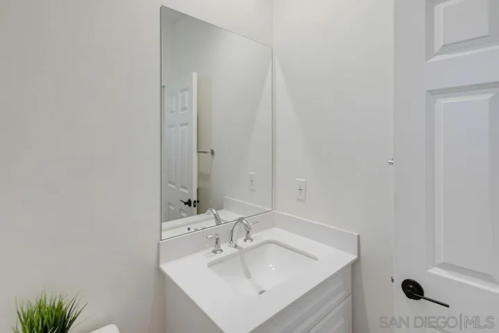 Entry level hallway half bathroom