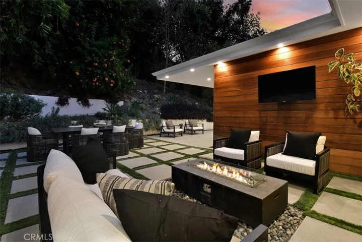 Backyard with Firepit at Twilight