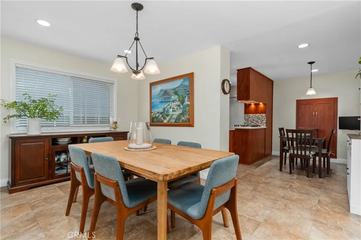 The dining room connects seamlessly to the kitchen area~