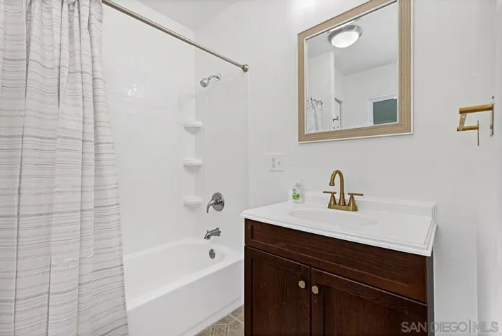 Separate bedroom off Living Rm w/ en suite bath.