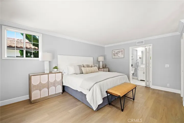 Primary Suite offers 2 closets, one with mirror doors and the other walkin