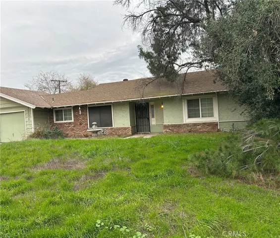Front of house with green grass