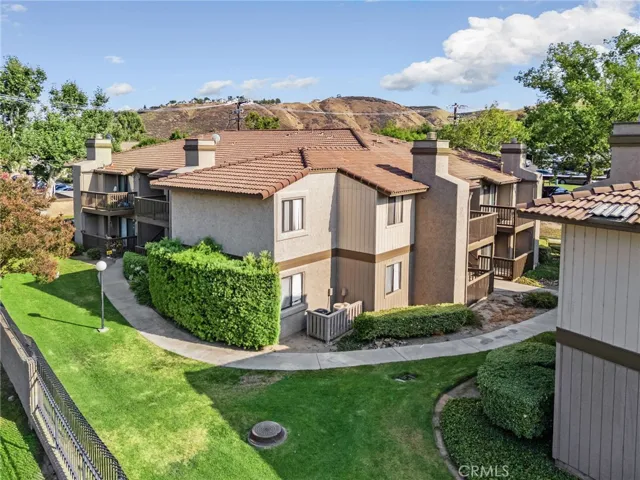  Manicured lawns, tiled rooftops, and mature hedges create a peaceful, resort-like setting.