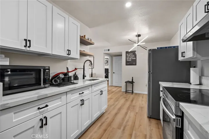 While open wood shelving offers both function and style.