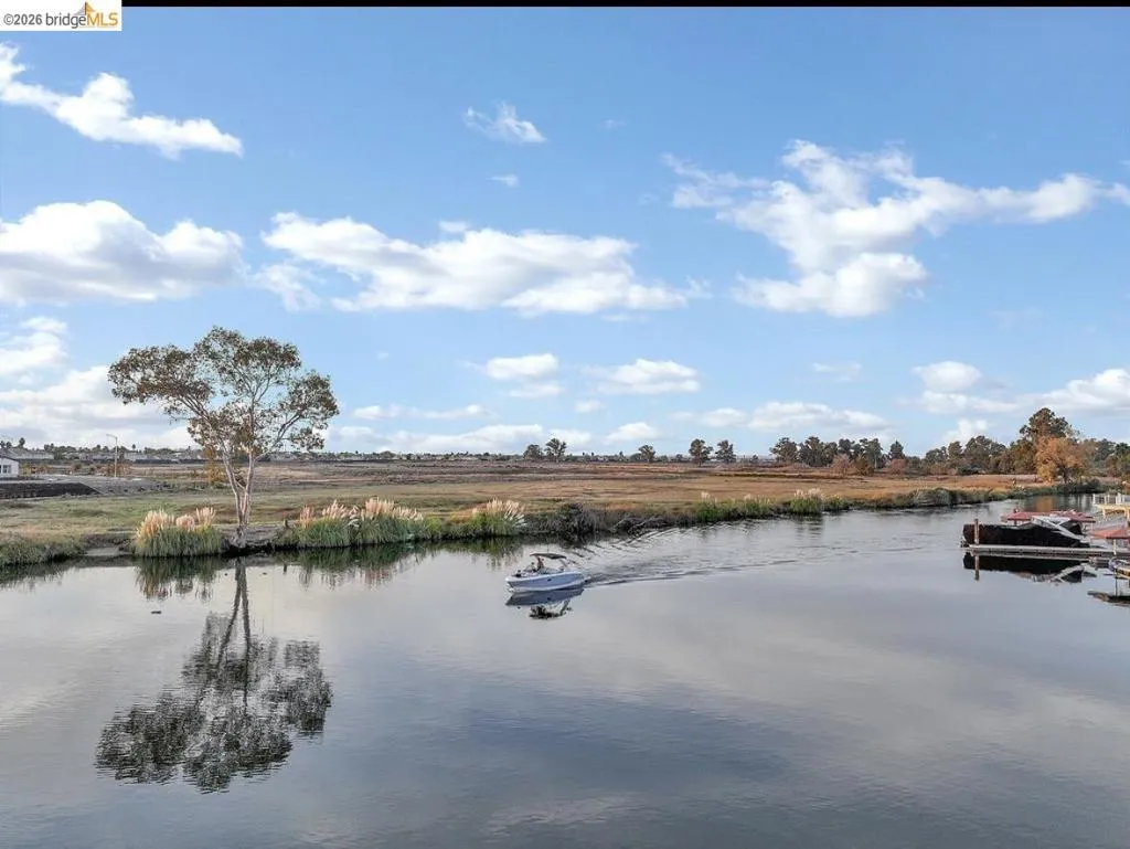 Water view with a boat dock