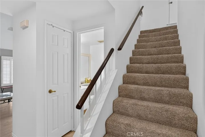 Entrance stairs to the right and half bath
