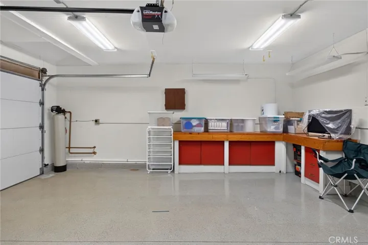 Garage Epoxy floors work station. EV charge available