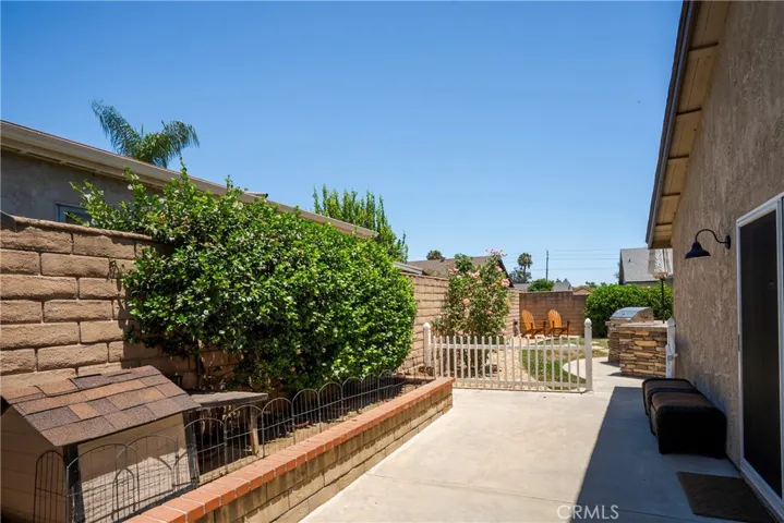 View from North side of House with Access to Garage and Kitchen