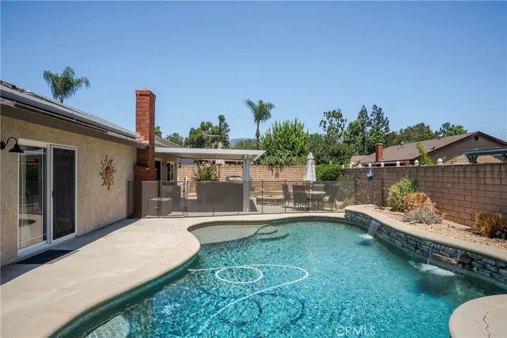 Pool with water falls and lounge step & Spa