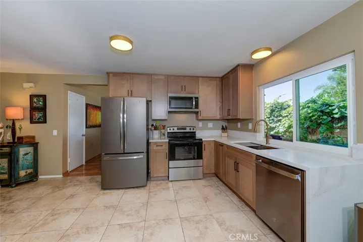 Brand New Kitchen. New Counters, Appliances, New Cabinets, Quartz Countertops with waterfall edge.