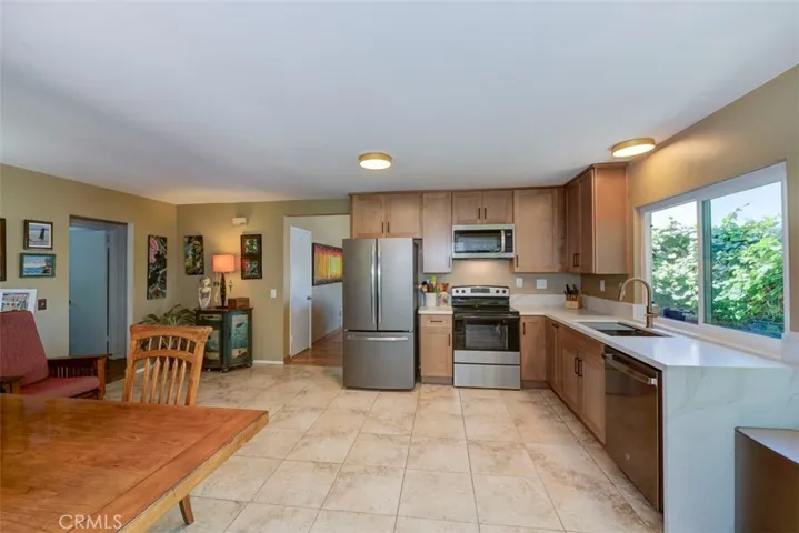 Brand New Kitchen. New Counters, Appliances, Quartz Countertops with waterfall edge.
