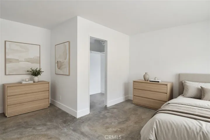 This photo has been virtually staged as the primary bedroom