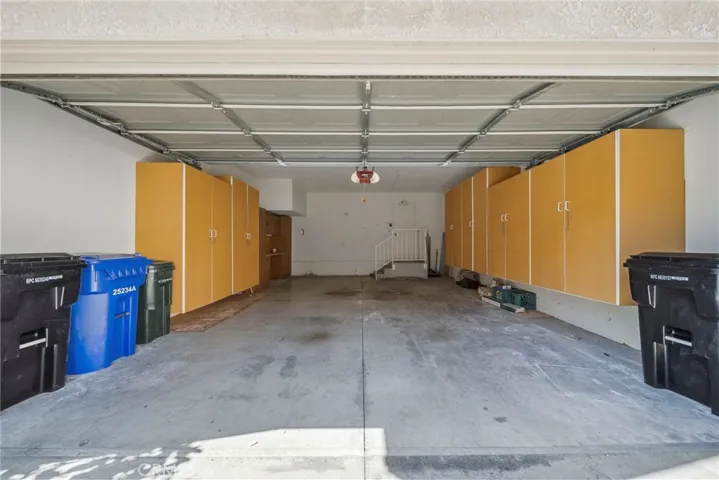 2 car garage with built-in storage cabinets